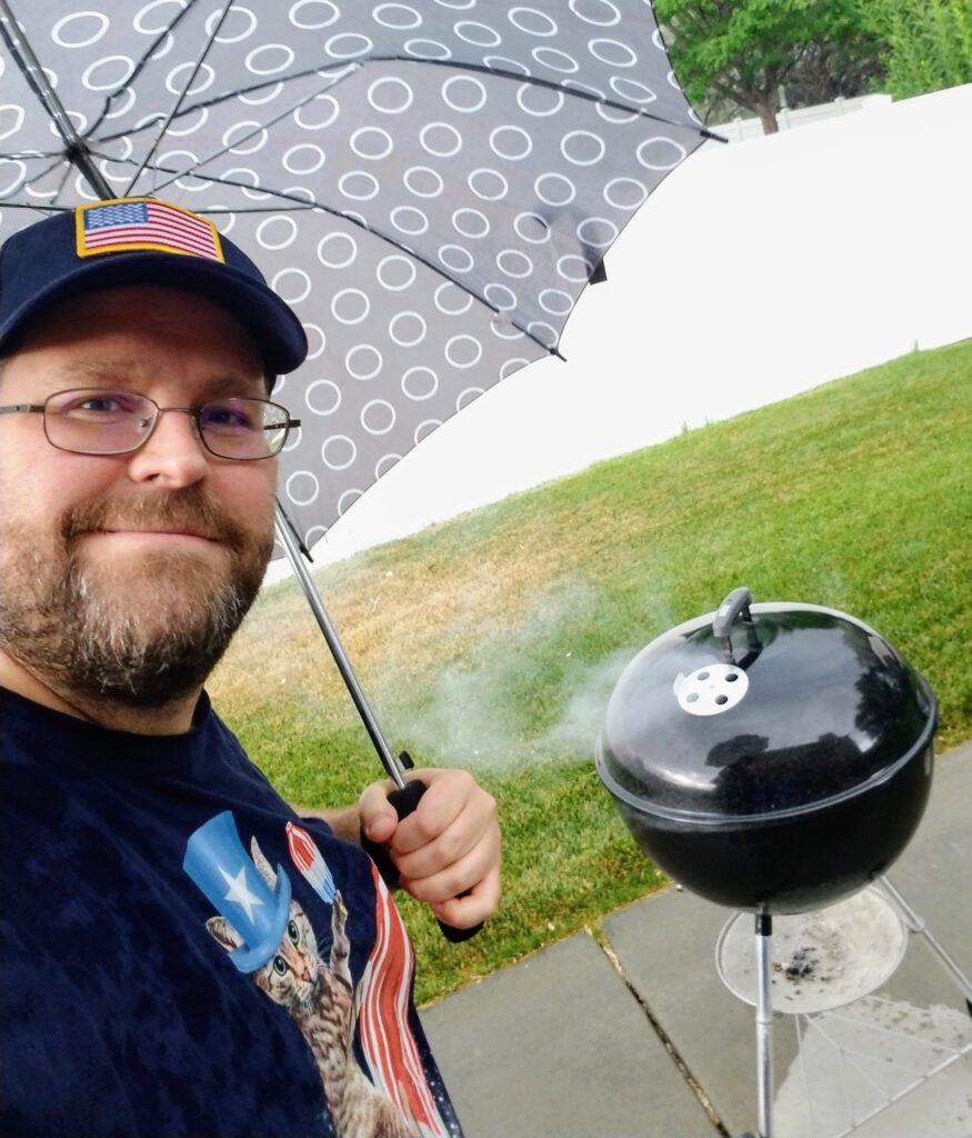 The author grilling in the rain